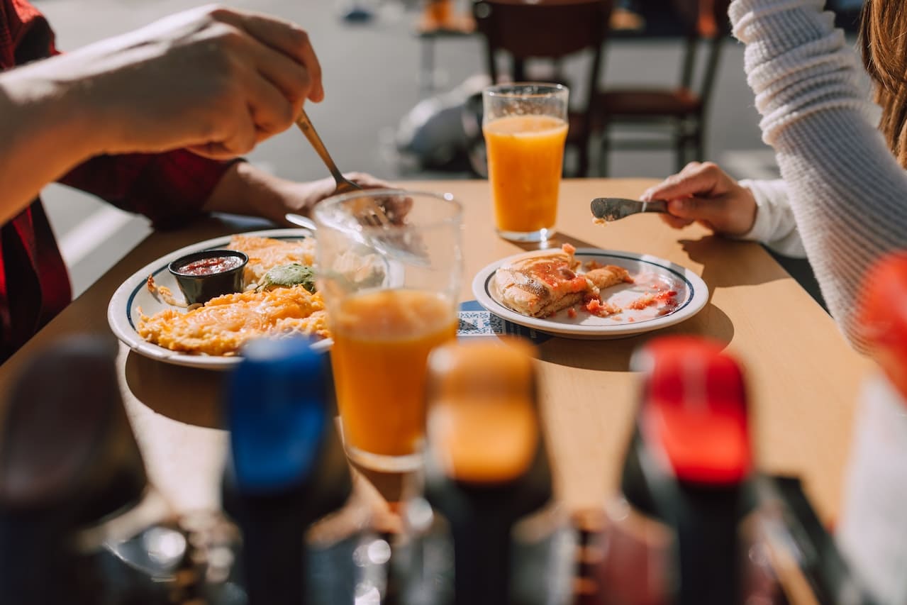 A couple eating a healthy, protein-rich breakfast